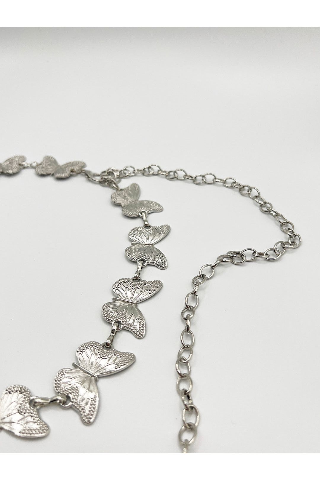 Butterfly Chain Belt In Silver by SVNX