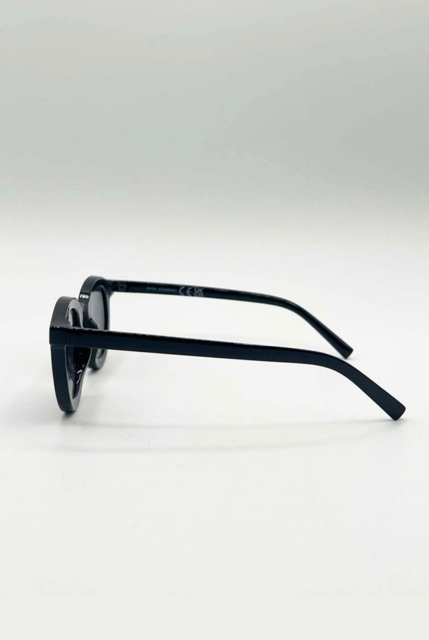 Bold Rounded Sunglasses In Black by SVNX
