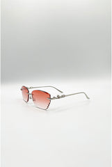 Cat Eye Rimless Sunglasses In Orange by SVNX
