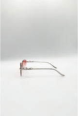 Cat Eye Rimless Sunglasses In Orange by SVNX