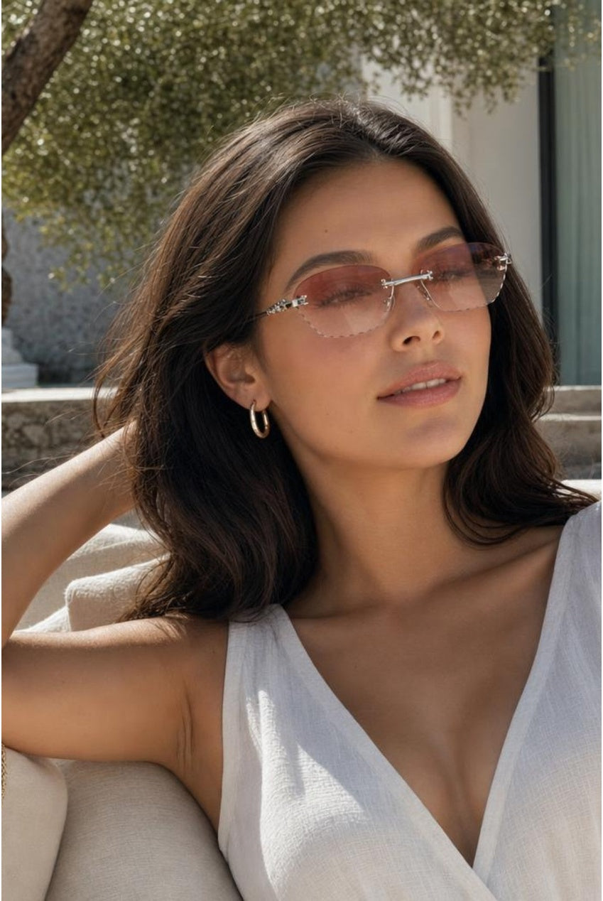 Cat Eye Rimless Sunglasses In Orange by SVNX
