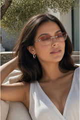Cat Eye Rimless Sunglasses In Orange by SVNX