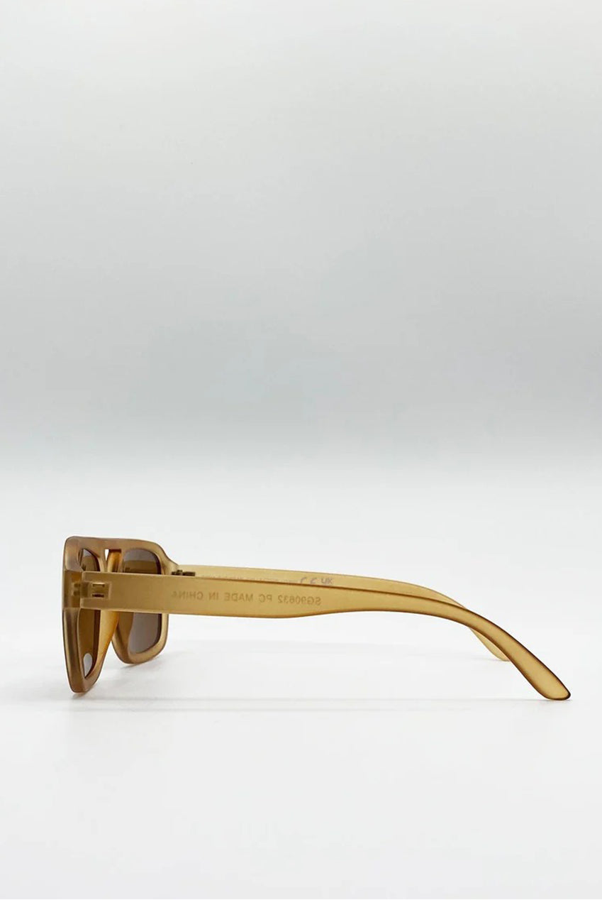 70's Navigator Sunglasses In Matte Sand by SVNX